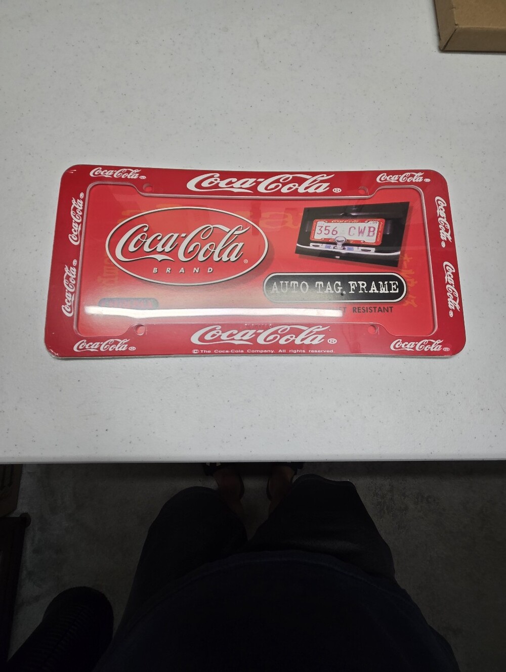 Coca-Cola Plastic License Plate Frame. New In Original Packaging.  Red & White.